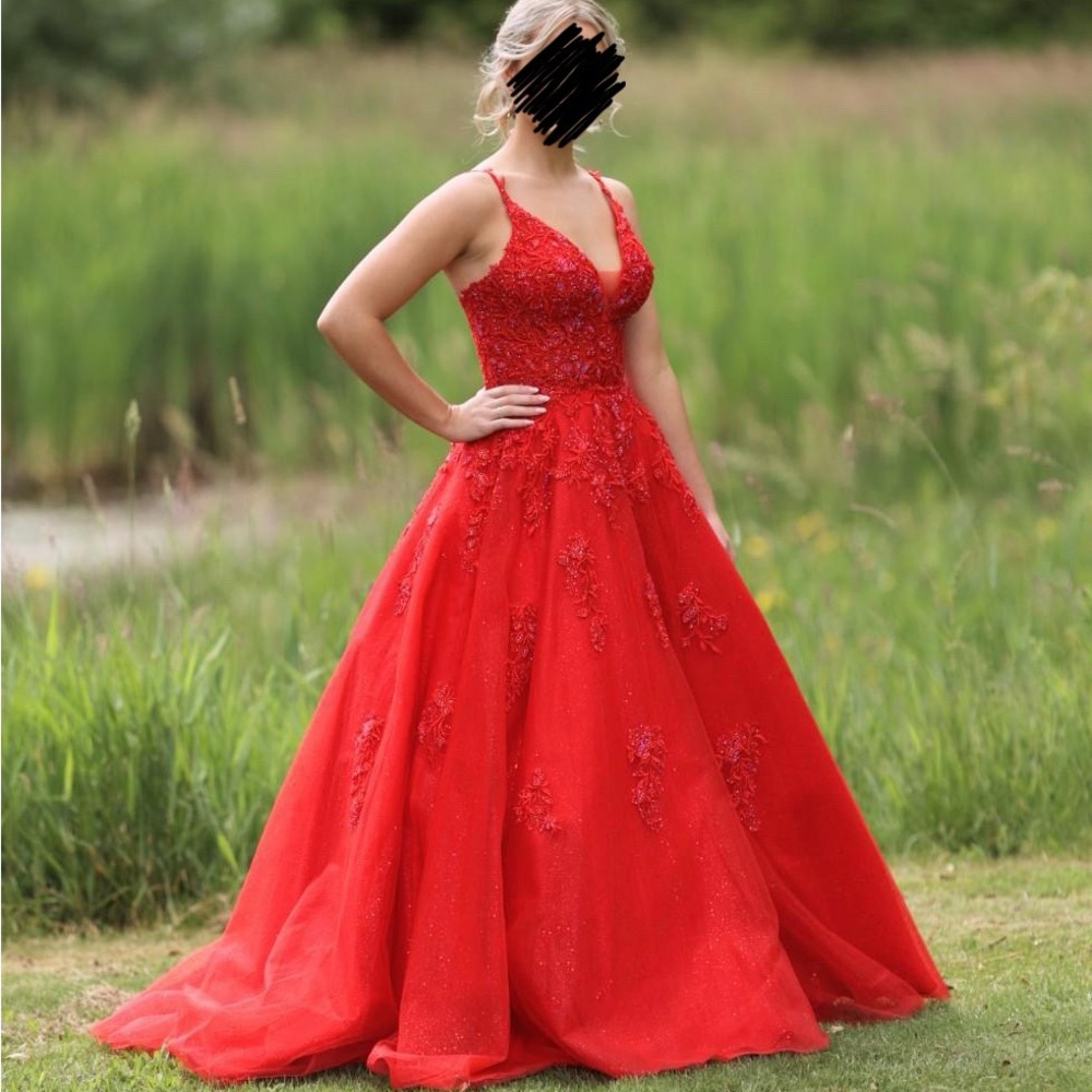 Stunning red prom dress.